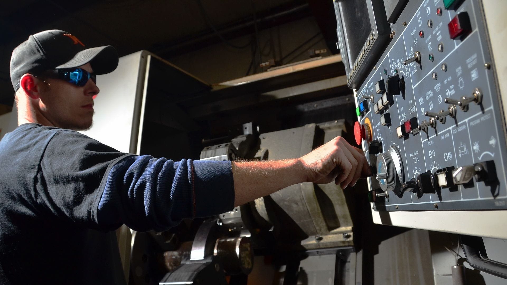 Worker Working on Machine